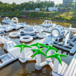 Lake Days inflatable obstacle course with palm trees Carlton Landing